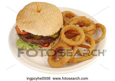 Hamburger and onion rings View Large Photo Image Stock Photograph - Hamburger and onion rings . Fotosearch