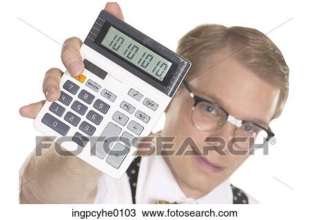 Man holding calculator View Large Photo Image Stock Image - Man holding calculator . Fotosearch