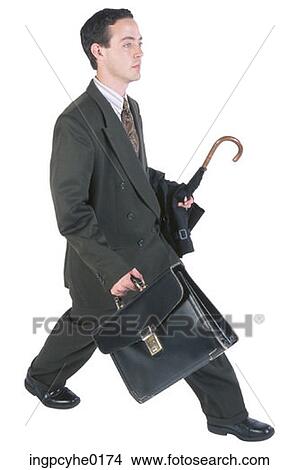 man professional carrying briefcase and umbrella walking View Large Photo Image Picture - man professional carrying briefcase and umbrella walking . Fotosearch