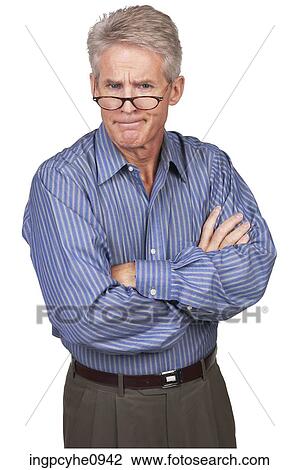 Middle aged man making a frustrated expression View Large Photo Image Stock Image - Middle aged man making a frustrated expression . Fotosearch
