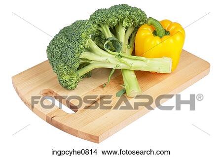 pepper and broccoli on cutting board View Large Photo Image Picture - pepper and broccoli on cutting board . Fotosearch