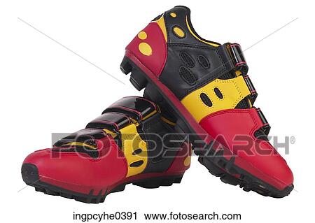 Red and yellow biking shoes L1 View Large Photo Image Stock Image - Red and yellow biking shoes L1. Fotosearch