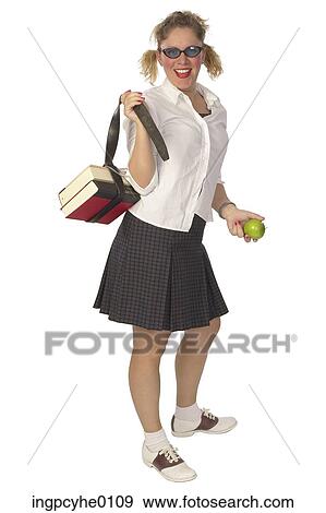 Schoolgirl with green apple View Large Photo Image Stock Photo - Schoolgirl with green apple . Fotosearch