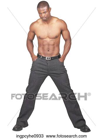 Shirtless young African American man standing with his hands in his pockets View Large Photo Image Stock Image - Shirtless young African American man standing with his hands in his pockets . Fotosearch