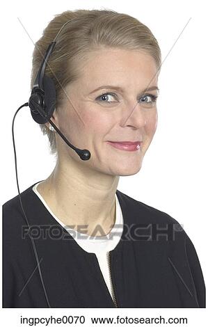 Smiling businesswoman wearing headset View Large Photo Image Stock Image - Smiling businesswoman wearing headset . Fotosearch