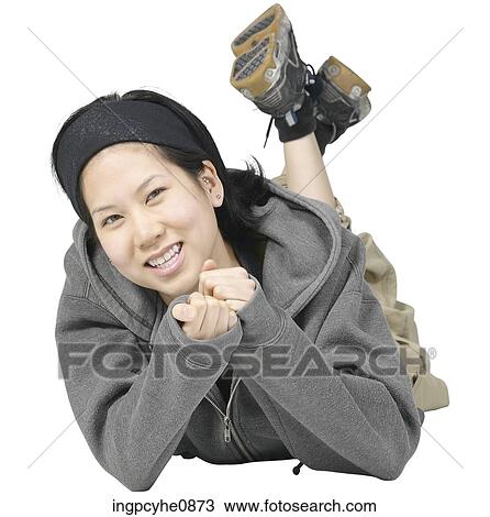 Smiling female wearing bandanna lying down View Large Photo Image Stock Image - Smiling female wearing bandanna lying down . Fotosearch