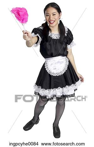 Smiling maid with pink feather duster View Large Photo Image Picture - Smiling maid with pink feather duster . Fotosearch