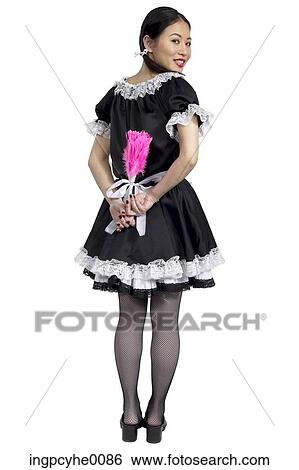 Smiling maid with pink feather duster View Large Photo Image Stock Photograph - Smiling maid with pink feather duster . Fotosearch