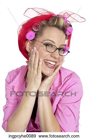 Smiling woman with her hair in pink curlers View Large Photo Image Stock Photo - Smiling woman with her hair in pink curlers . Fotosearch