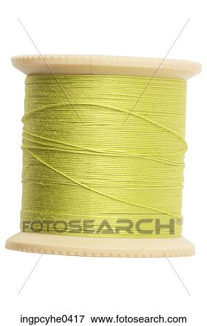 Spool of green thread L2 View Large Photo Image Stock Photo - Spool of green thread L2. Fotosearch