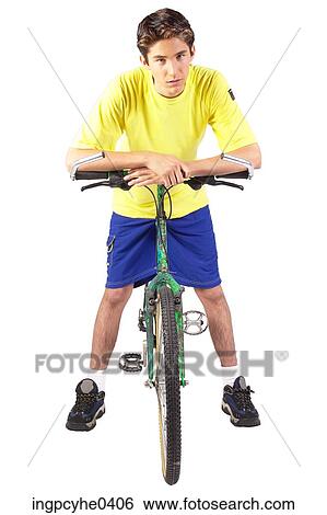 Teenager on bicycle View Large Photo Image Stock Photograph - Teenager on bicycle . Fotosearch