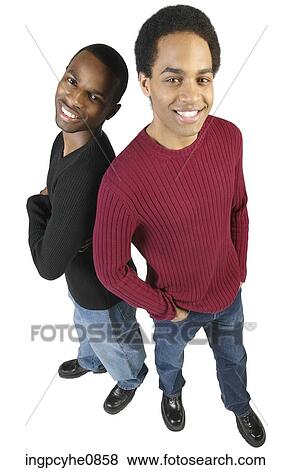 Two smiling young adults View Large Photo Image Stock Photo - Two smiling young adults. Fotosearch