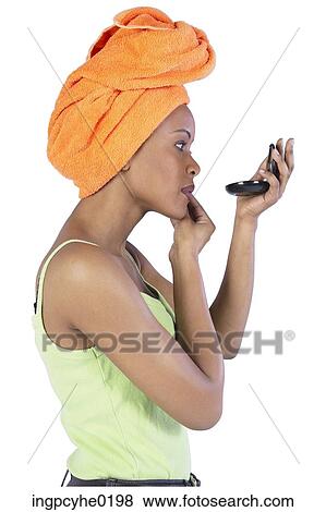 woman applying make-up View Large Photo Image Stock Photo - woman applying make-up . Fotosearch