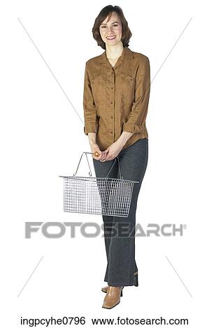 Woman holding metal shopping basket View Large Photo Image Stock Photograph - Woman holding metal shopping basket . Fotosearch