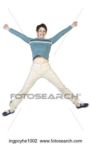 Woman in casual attire jumping View Large Photo Image Stock Image - Woman in casual attire jumping. Fotosearch