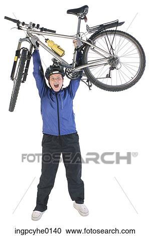 woman lifting a bicycle View Large Photo Image Stock Image - woman lifting a bicycle . Fotosearch