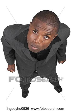 Young African American business man making an angry expression View Large Photo Image Stock Photograph - Young African American business man making an angry expression . Fotosearch
