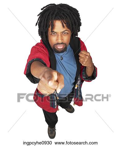 Young African American pointing in front of him View Large Photo Image Stock Image - Young African American pointing in front of him . Fotosearch