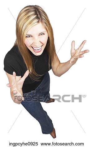 Young blond woman making an angry expression View Large Photo Image Stock Photography - Young blond woman making an angry expression . Fotosearch