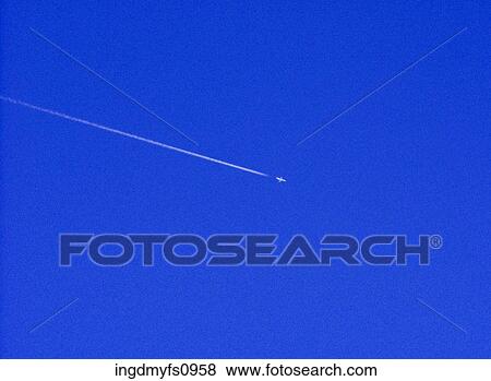 Airplane Flying High in the Sky View Large Photo Image Stock Photo - Airplane Flying High in the Sky. Fotosearch
