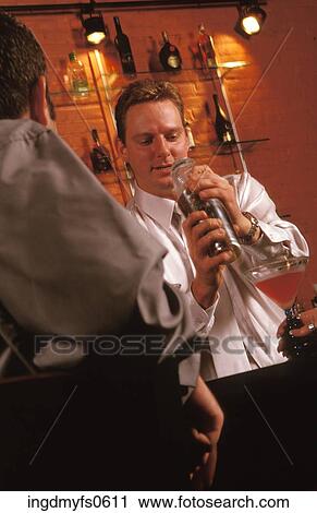 Bartender Mixing a Drink View Large Photo Image Stock Image - Bartender Mixing a Drink. Fotosearch