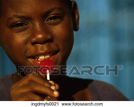 Boy with Lollipop View Large Photo Image Stock Image - Boy with Lollipop. Fotosearch
