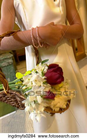 Picture - Bridesmaid with Flowers. Fotosearch