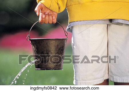 Bucket With a Hole in it View Large Photo Image Stock Image - Bucket With a Hole in it. Fotosearch