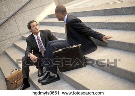 Businessmen Talking on a Break View Large Photo Image Stock Image - Businessmen Talking on a Break. Fotosearch