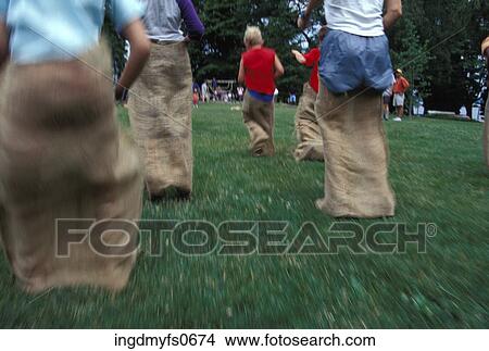 Picture - Children Having a Sack Race. Fotosearch