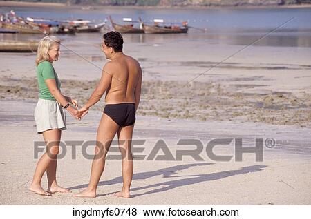 Couple on the Beach View Large Photo Image Stock Photo - Couple on the Beach. Fotosearch