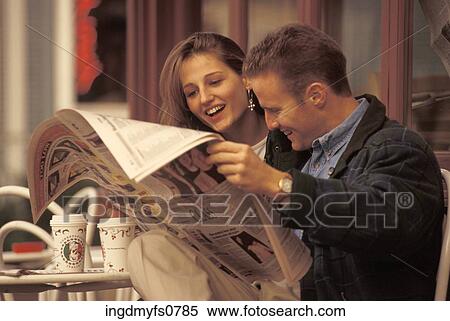 Couple Reading the Newspaper Together View Large Photo Image Stock Photography - Couple Reading the Newspaper Together. Fotosearch