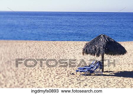 Deserted Chairs on a Tropical Beach View Large Photo Image Stock Image - Deserted Chairs on a Tropical Beach. Fotosearch