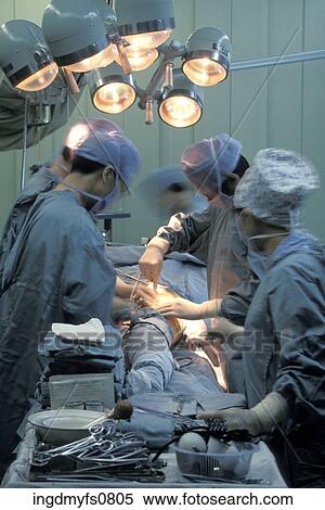 Doctors Performing Surgery View Large Photo Image Stock Photography - Doctors Performing Surgery. Fotosearch