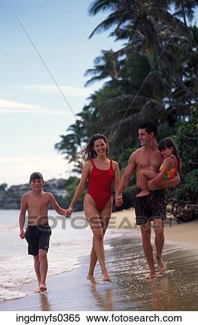 Stock Photography - Family On Beach. Fotosearch
