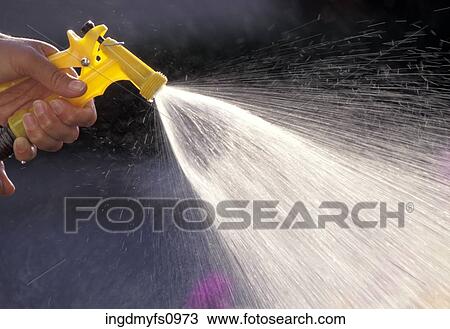 Hand Spraying a Garden Hose View Large Photo Image Stock Image - Hand Spraying a Garden Hose. Fotosearch