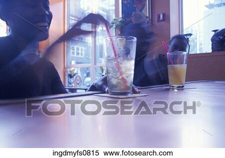 Having a Drink at a Sunny Bar View Large Photo Image Stock Photography - Having a Drink at a Sunny Bar. Fotosearch