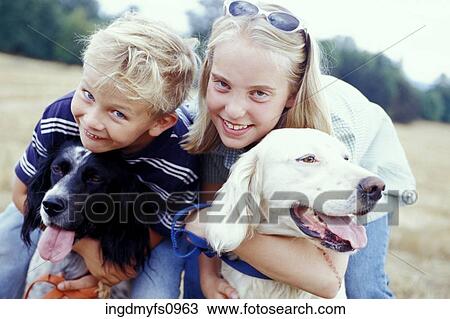 Kids Hugging Dogs View Large Photo Image Stock Image - Kids Hugging Dogs. Fotosearch