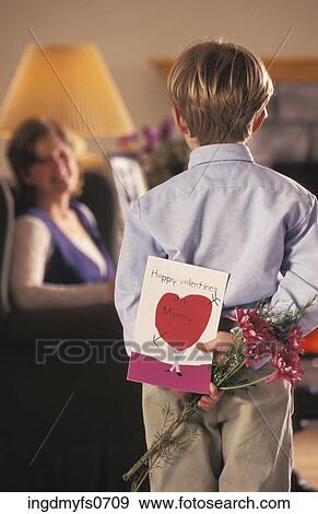 Little Boy Giving Valentine to Mom View Large Photo Image Stock Photo - Little Boy Giving Valentine to Mom. Fotosearch