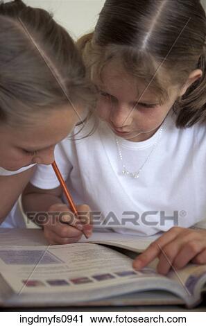 Little Girls Doing Homework Together View Large Photo Image Stock Image - Little Girls Doing Homework Together. Fotosearch