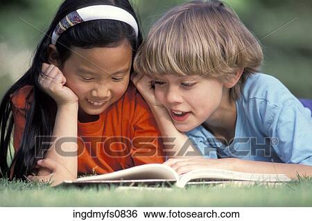 Little Kids Reading Together View Large Photo Image Stock Photograph - Little Kids Reading Together. Fotosearch