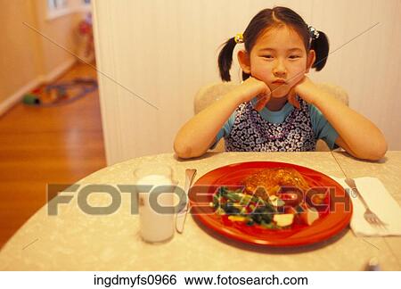 Mad Little Girl Who Won't Eat Her Dinner View Large Photo Image Stock Photograph - Mad Little Girl Who Won't Eat Her Dinner. Fotosearch