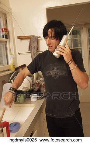 Man in Kitchen on Phone View Large Photo Image Stock Photograph - Man in Kitchen on Phone. Fotosearch