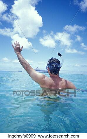 Man Snorkeling and Waving at Cruise Ship View Large Photo Image Stock Photo - Man Snorkeling and Waving at Cruise Ship. Fotosearch