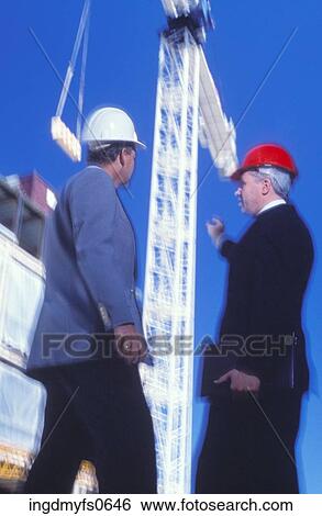 Men in Hard Hats Talking View Large Photo Image Stock Photograph - Men in Hard Hats Talking. Fotosearch