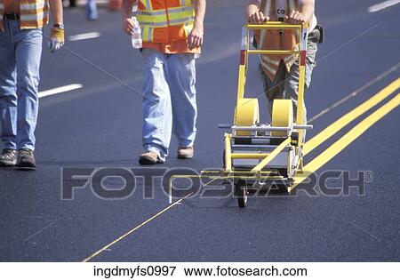 Painting Yellow Lines on the Road View Large Photo Image Stock Photo - Painting Yellow Lines on the Road. Fotosearch