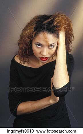 Stock Image - Portrait of Young Woman. Fotosearch