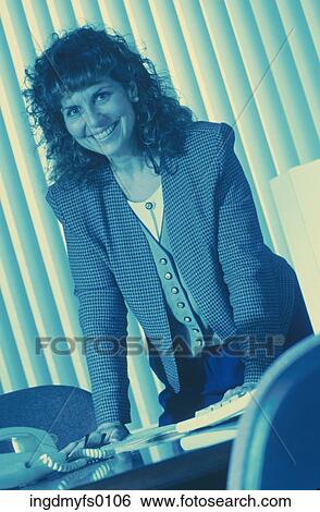 Professional Woman at Desk View Large Photo Image Stock Photograph - Professional Woman at Desk. Fotosearch