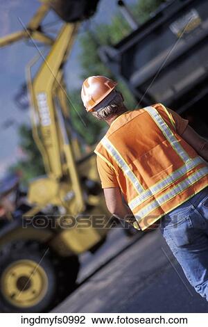 Road Construction Worker and Heavy Equipment View Large Photo Image Stock Image - Road Construction Worker and Heavy Equipment. Fotosearch