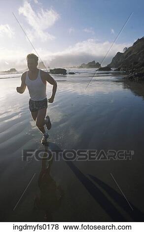 Runner on the Beach View Large Photo Image Stock Photo - Runner on the Beach. Fotosearch